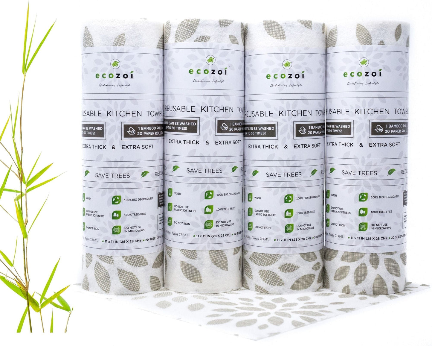 Four rolls of ecozoi reusable bamboo kitchen towels on a white background with greenery.