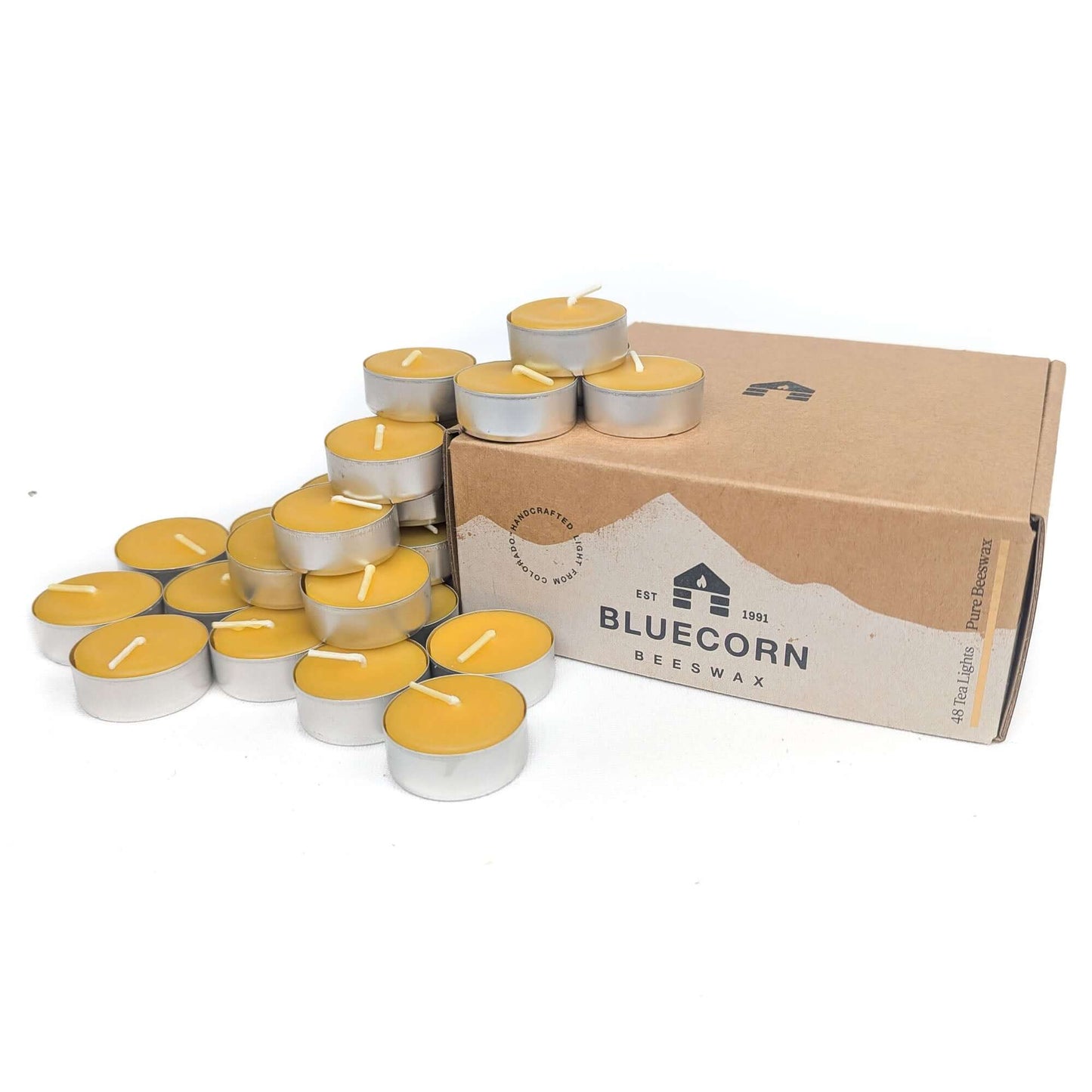 Box of Bluecorn Beeswax tea light candles on a white background