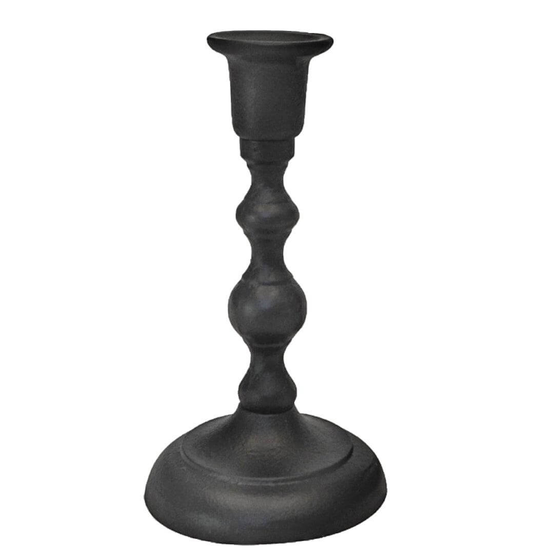 Black candle holder on a white background