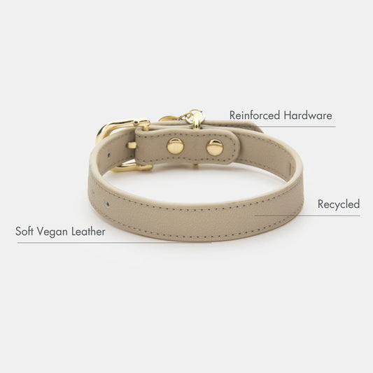 Beige Copenhagen Dog Collar made with recycled materials and PETA-approved soft vegan leather with gold reinforced hardware on a white background