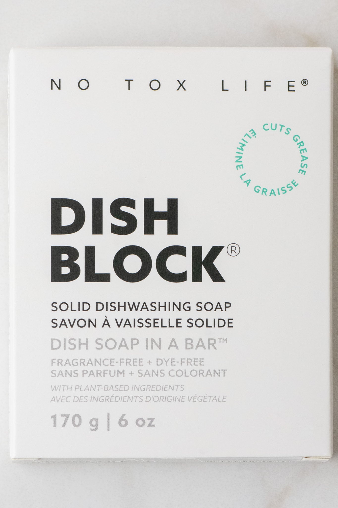Box of No Tox Life Dish Block solid dishwashing soap on a white background