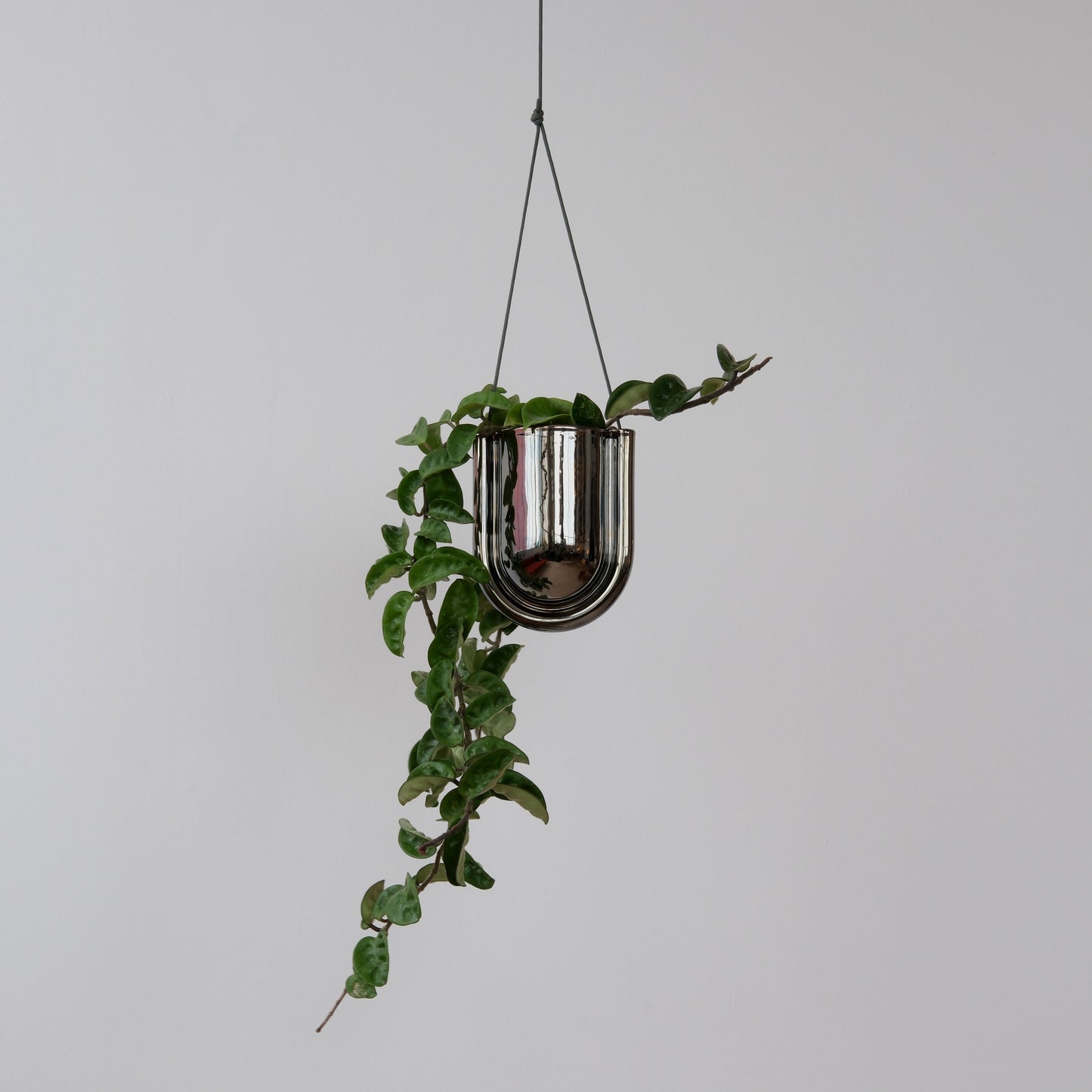Portico Handmade Hanging Planter in Chrome, made with premium stoneware, shown on a plain background