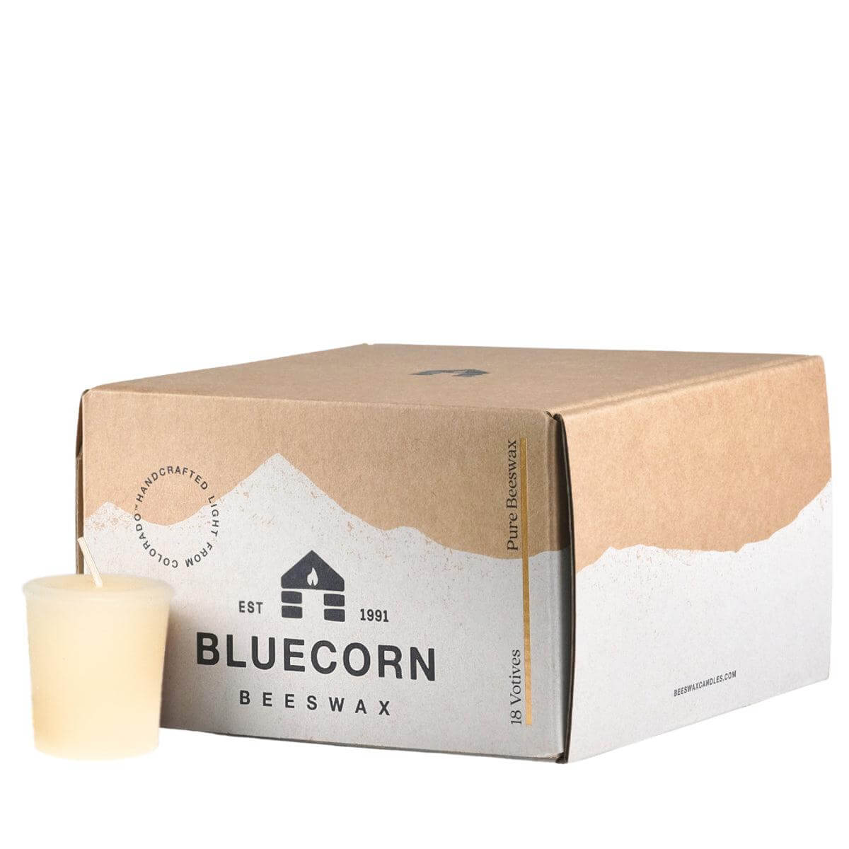 Box of Bluecorn Beeswax candles with a candle on a white background