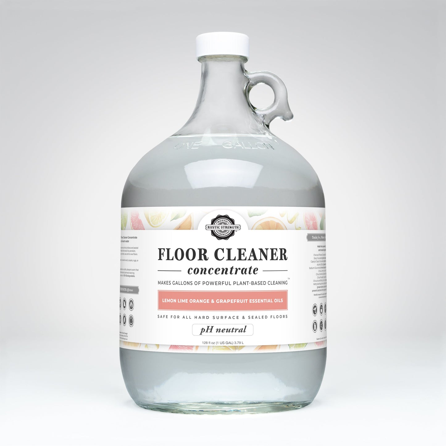 Glass container of Rustic Strength floor cleaner concentrate with a label on a white background