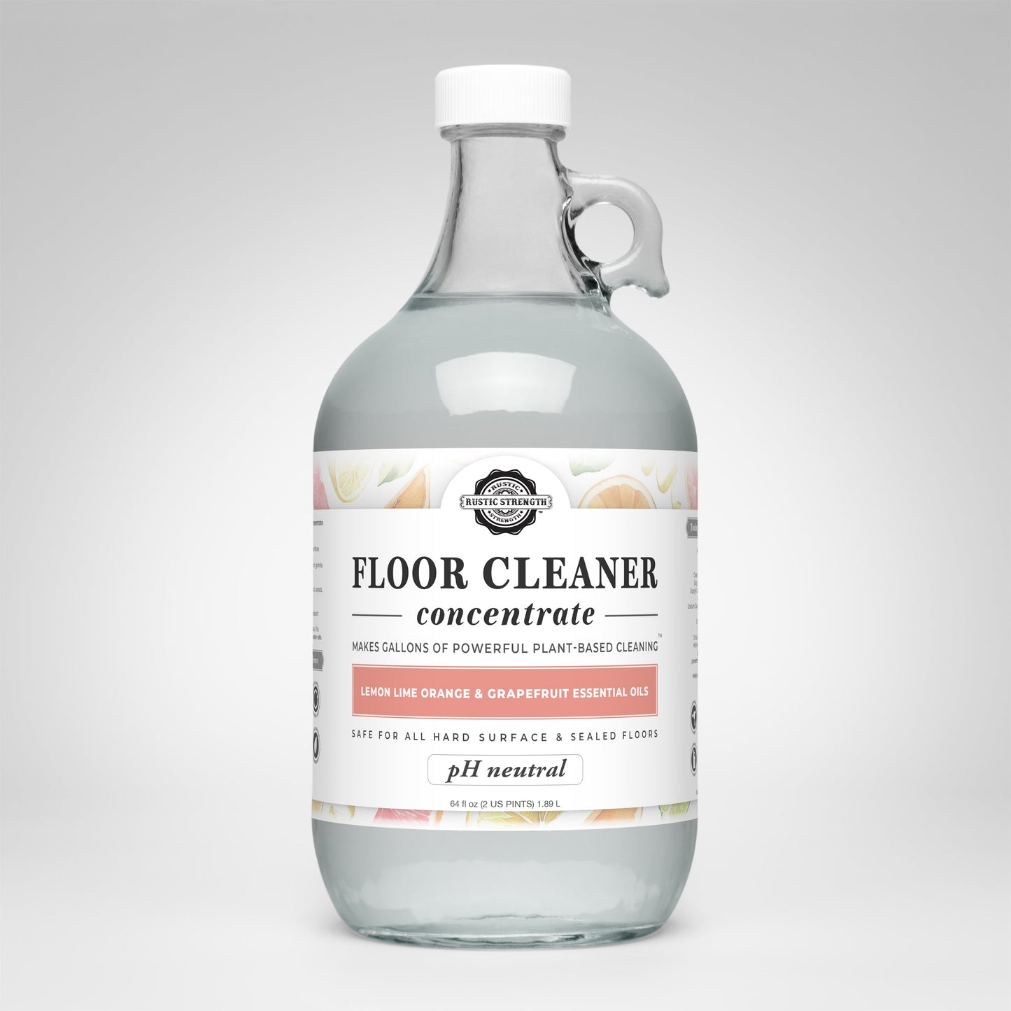 Rustic Strength floor cleaner concentrate glass bottle with label on a white background