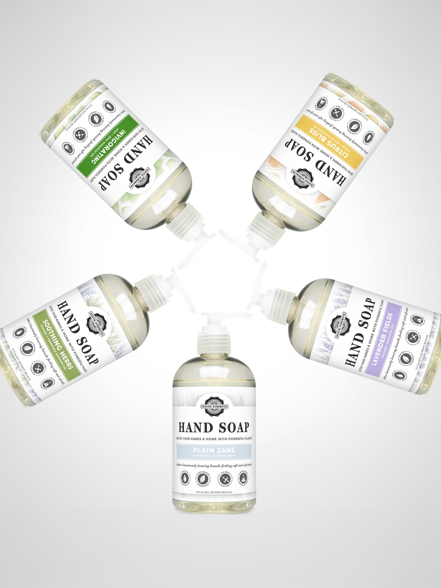 Five bottles of Rustic Strength Hand Soap product line on a light gray background.