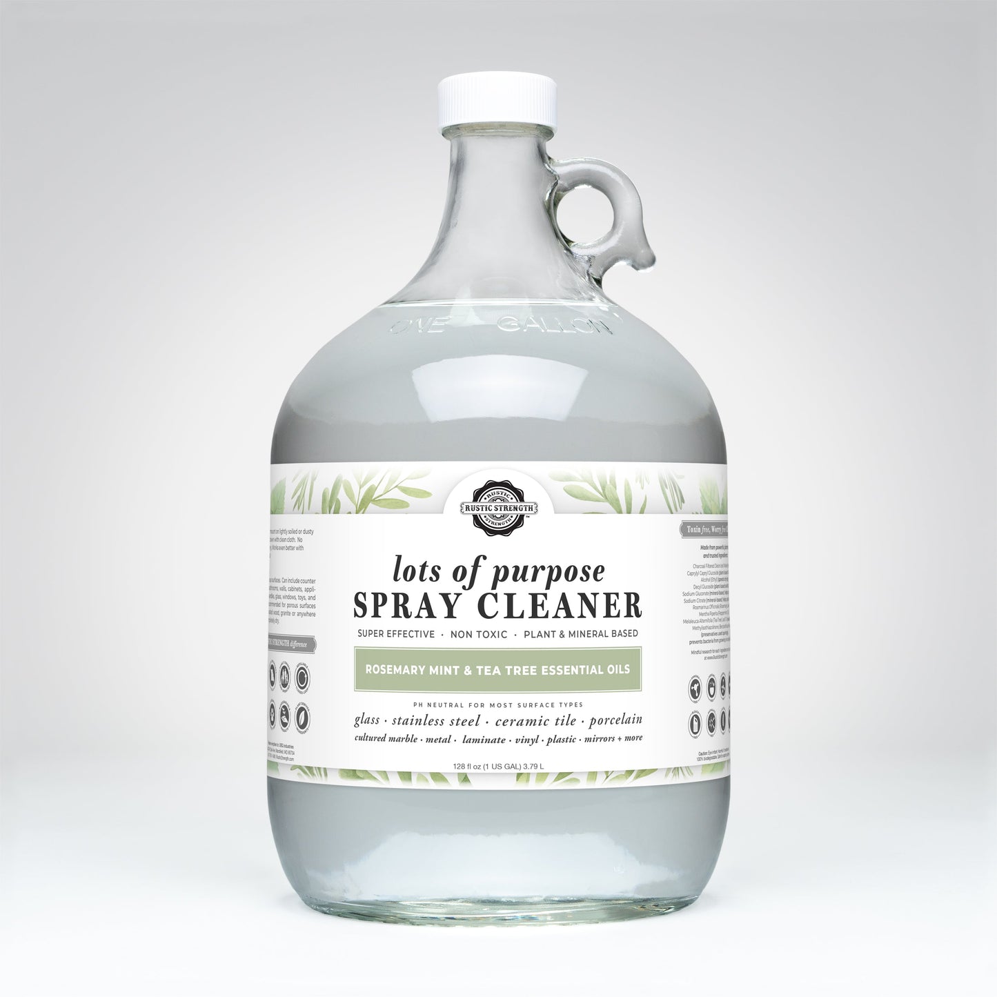 Glass bottle of spray cleaner with a label on a white background