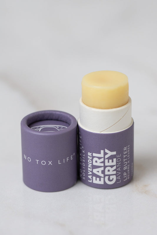 SolidSilk Lavender Earl Grey lip balm by No Tox Life with purple packaging on a white background