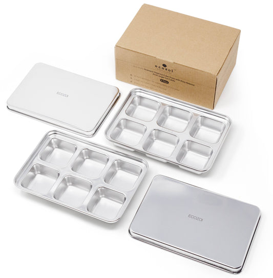 2-piece set of stainless steel ice cube trays for 12 large cubes with lids and a cardboard shipping box on a white background