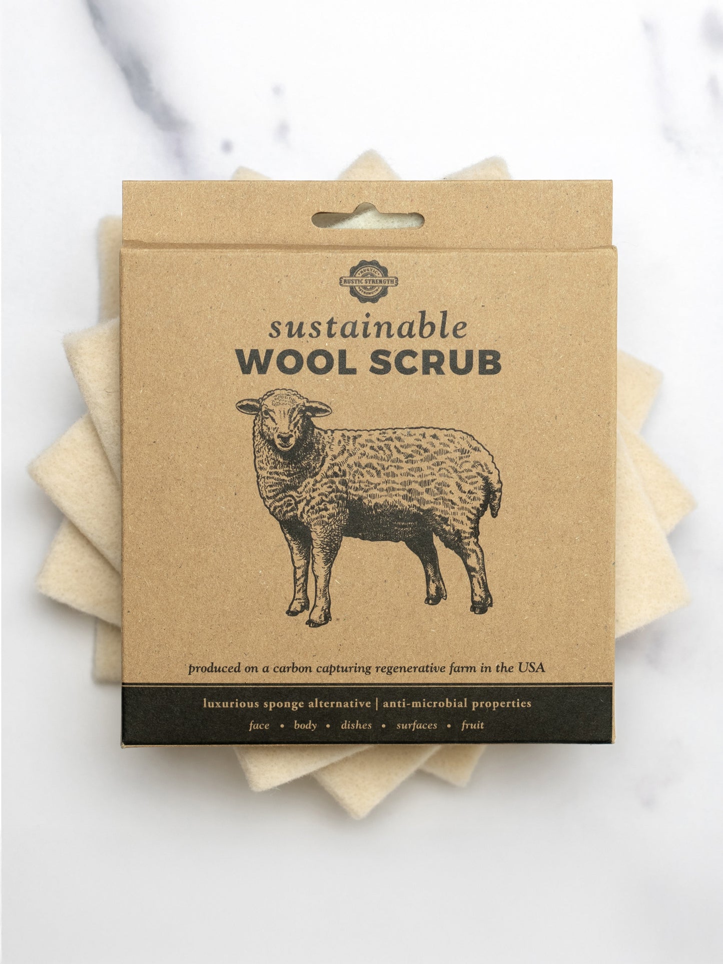 Sustainable wool scrub packaging with a sheep illustration on a white background