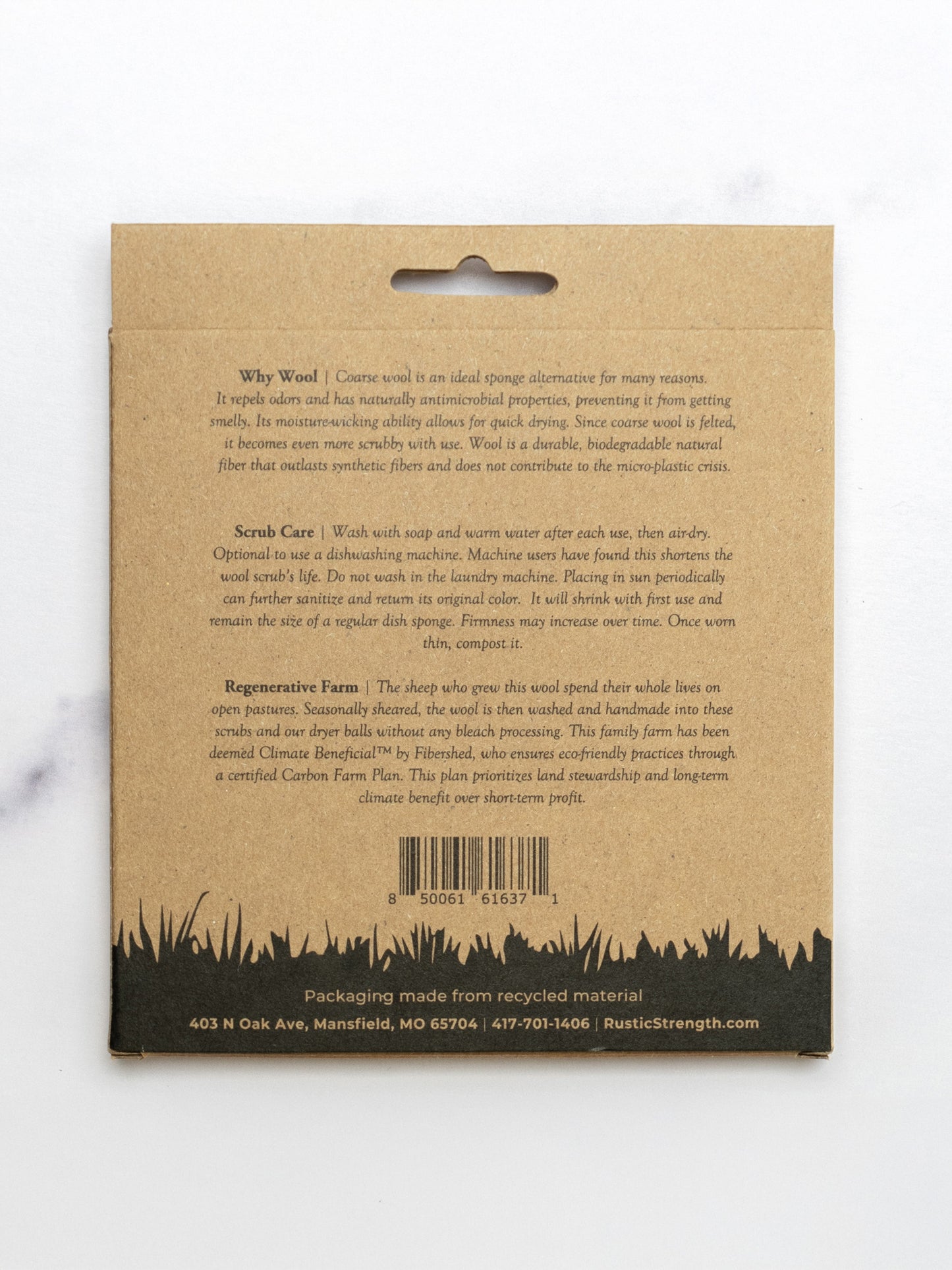 Back of a wool scrubs package with text and a barcode on a white background