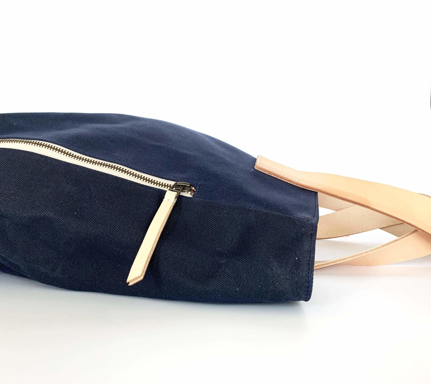 Waxed Canvas Tote Bag – Navy with Bright Pink Lining, Durable & Eco-Friendly, with zipper on a white background