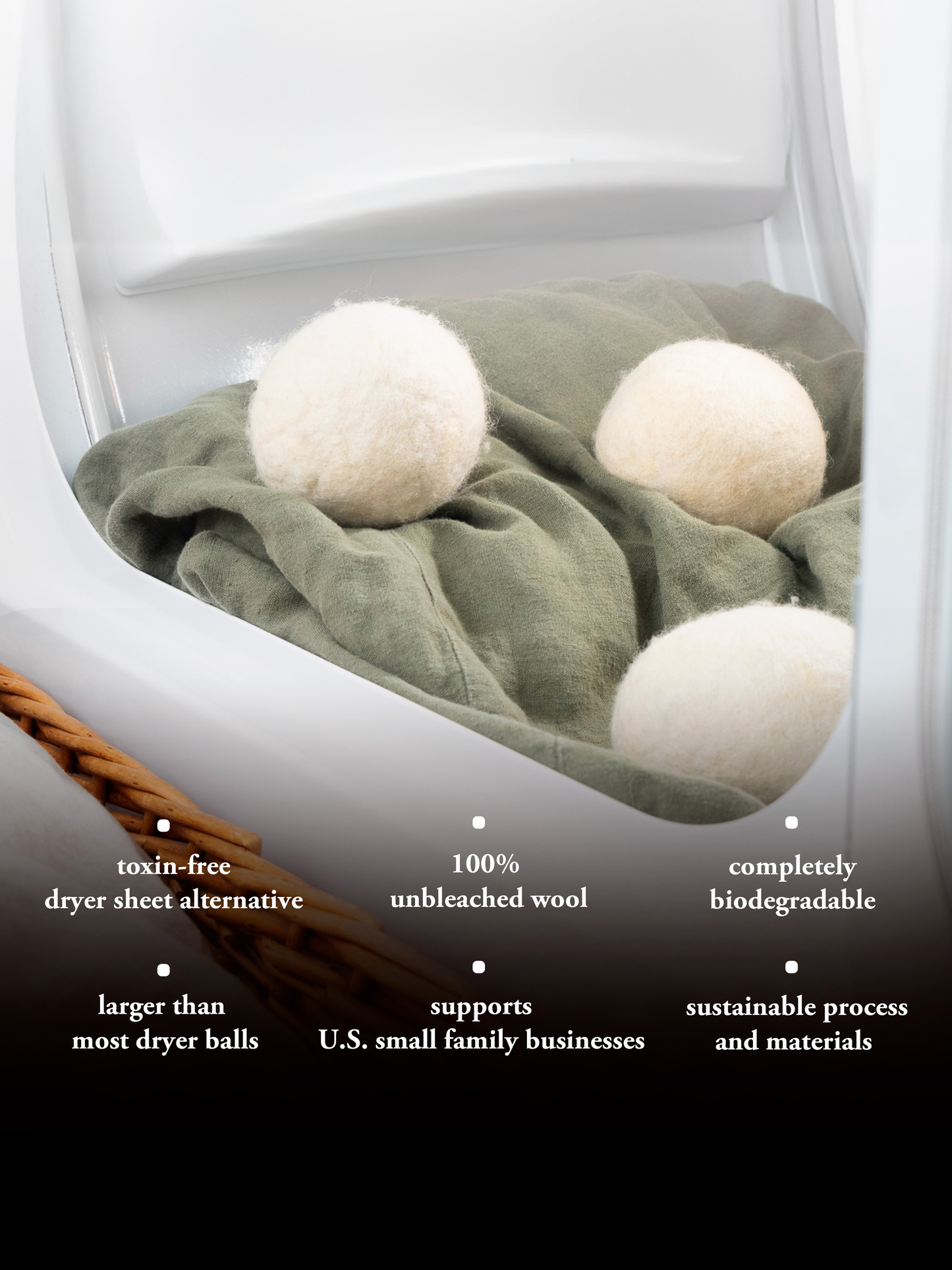 Wool dryer balls on a towel inside a dryer with sustainability benefits listed.