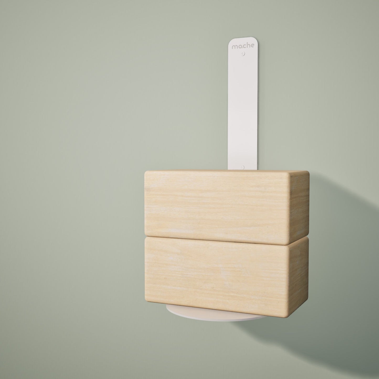 Two wooden yoga blocks resting on a floating yoga block shelf mounted on the wall, on a light green background