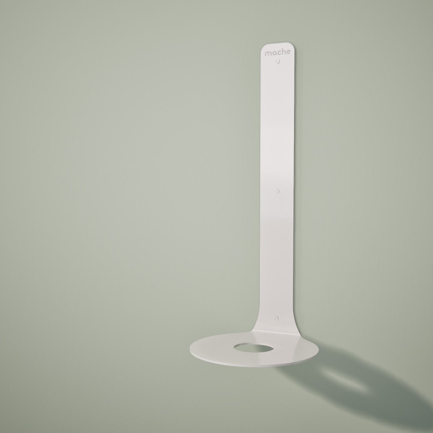 White Yoke yoga block floating shelf with 'Mache' branding on a light green background