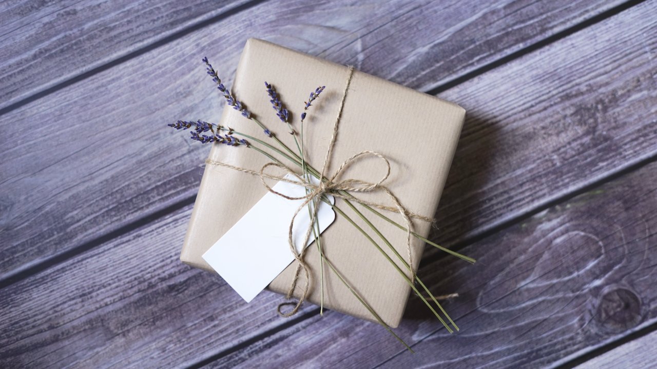 Gift in biodegradable wrapping paper with lavender sprig