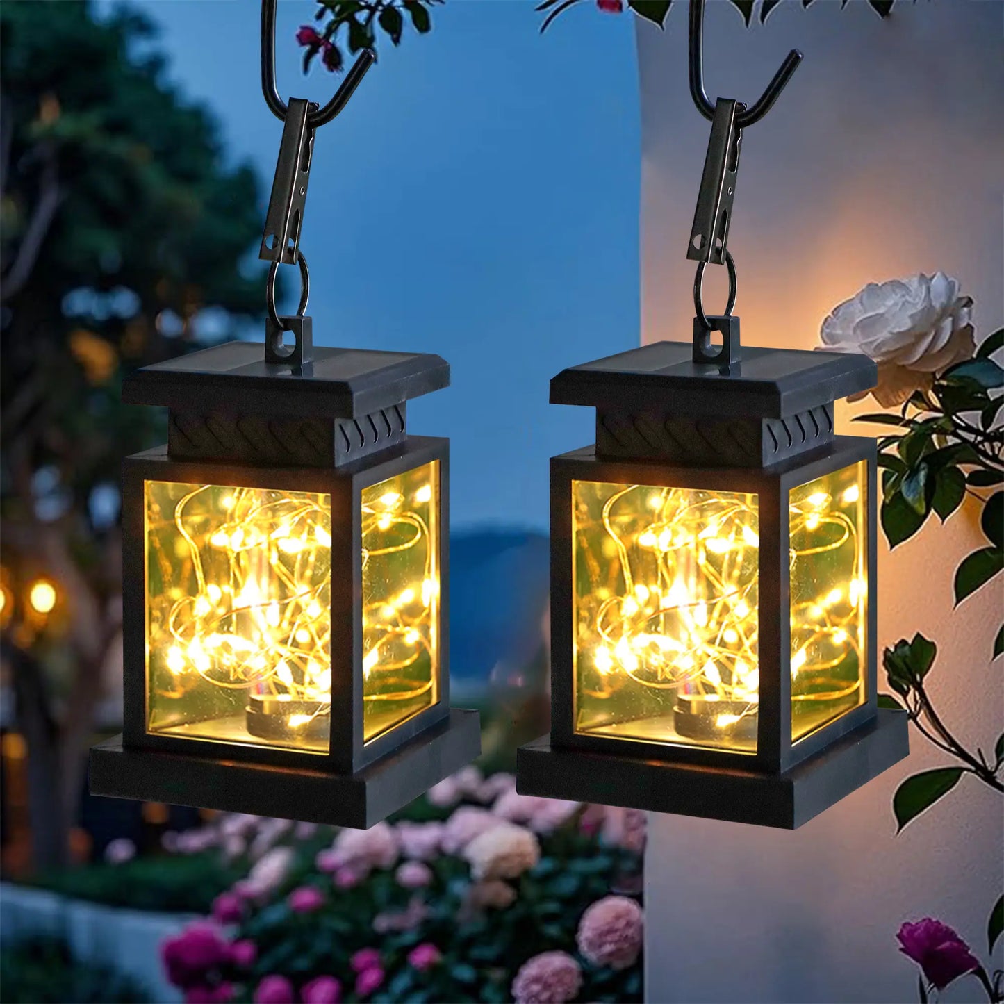 Two solar lanterns with string lights on a garden background. Rechargeable. Portable. Set of 6