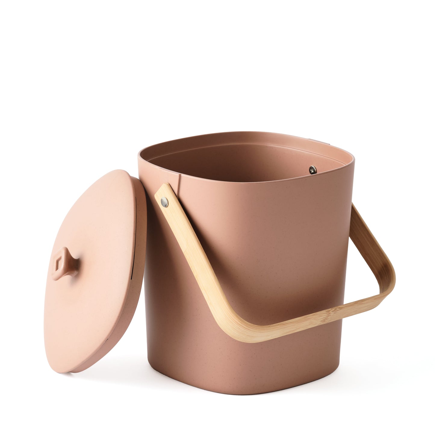 Terracotta-colored Astrik Compoast Bin made of 100% biodegradable plant-based plastic with a bamboo handle on a white background.