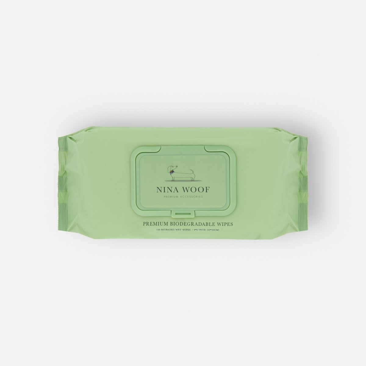 Green package of Nina Woof premium biodegradable pet wipes on a white background