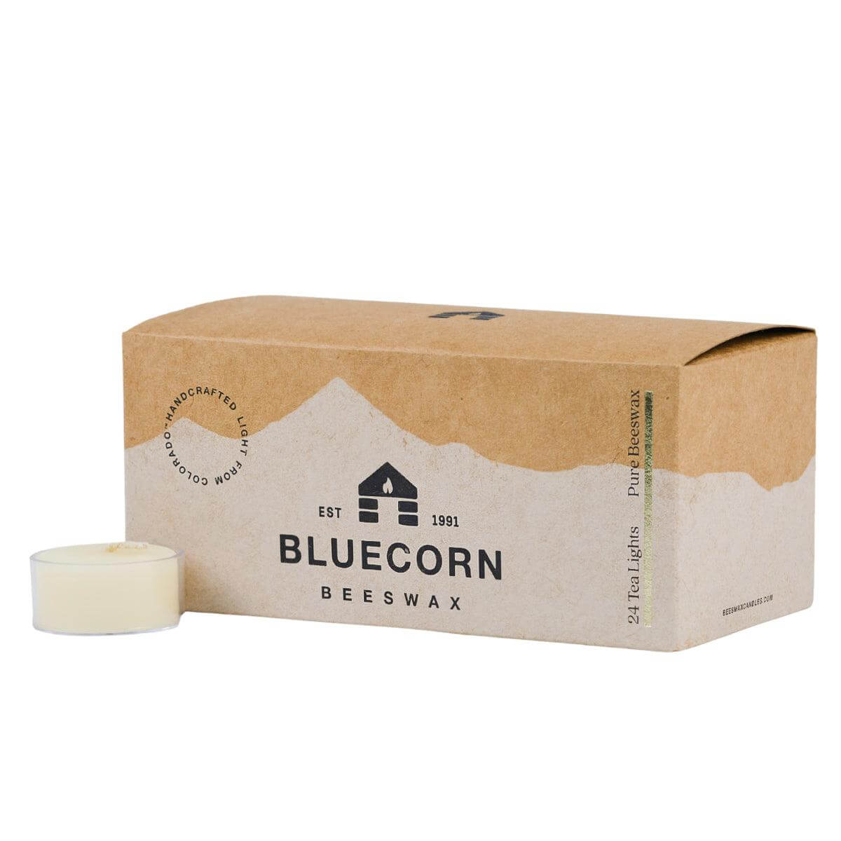 Box of 24 Bluecorn Beeswax candles with a single candle in front on a white background