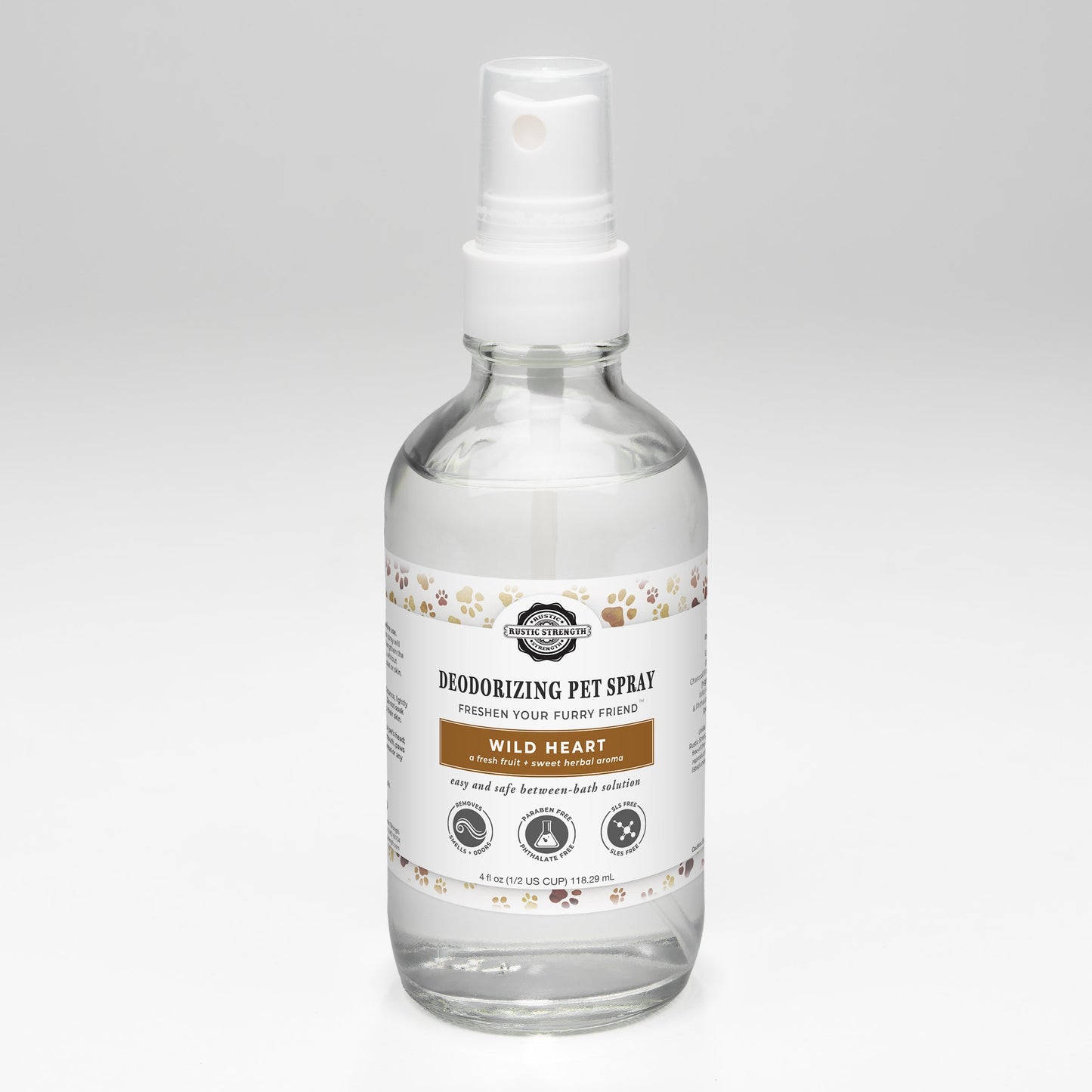 Clear spray bottle with a label on a white background