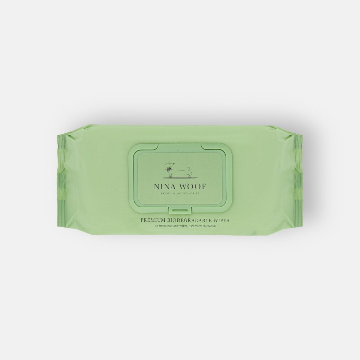 Green package of Nina Woof eco-friendly pet wipes on a white background