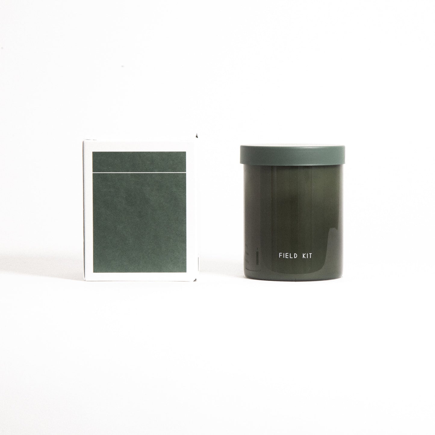 The Explore Candle in Reusable Glass Jar and Plastic-Free packaging. Top notes: ginger + bergamot; Mid notes: cedar + basil; Base notes: sandalwood + patchouli