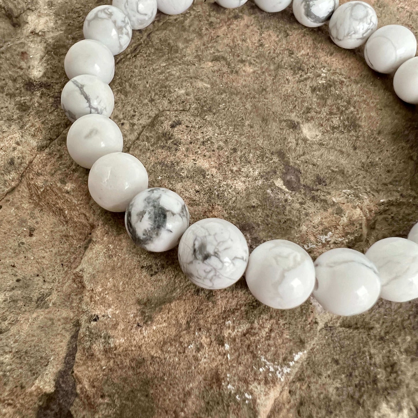 Howlite Bead Bracelet This bracelet is made with high-quality Howlite stones which bring calm and patience to the wearer. Zodiac Signs: Gemini and Virgo. Chakras: All. Handmade with authentic crystals & gemstones in Minneapolis, MN