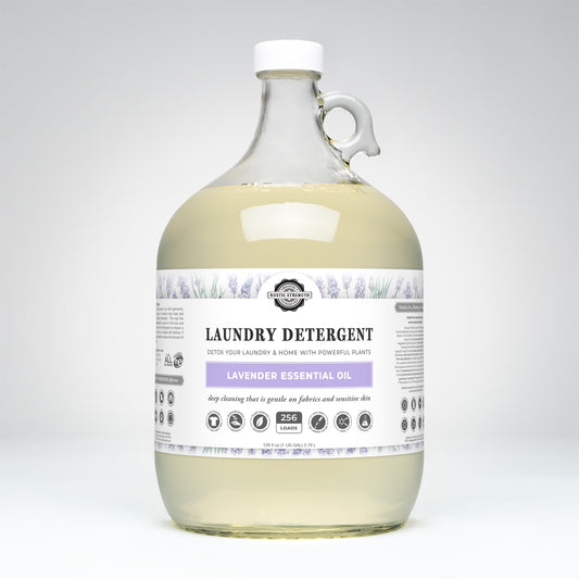 Large bottle of Rustic Strength lavender scented laundry detergent with a label on a white background