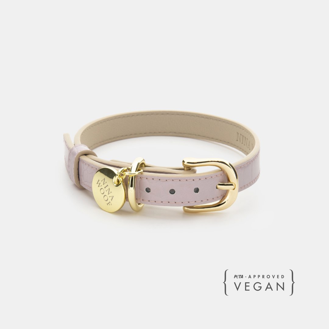 Lilac Nina Woof Vegan Leather Dog Collar with gold buckle and tag on a white background