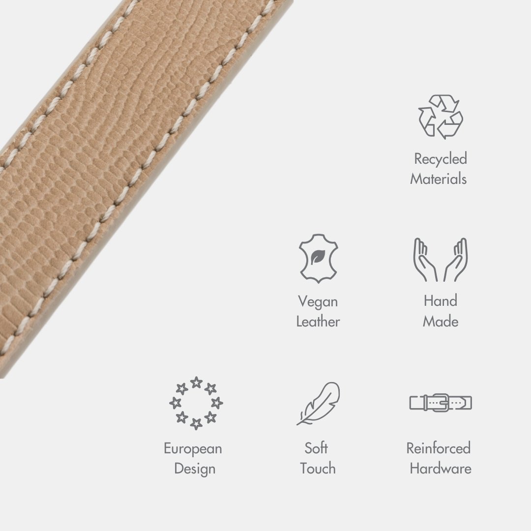 Close-up of a beige Nina Woof Vegan Leather Dog Collar with sustainability icons, showcasing the use of Recycled Materials, Vegan Leather, Hand Made product, European Design, Soft Touch and Reinforced Hardware on a white background