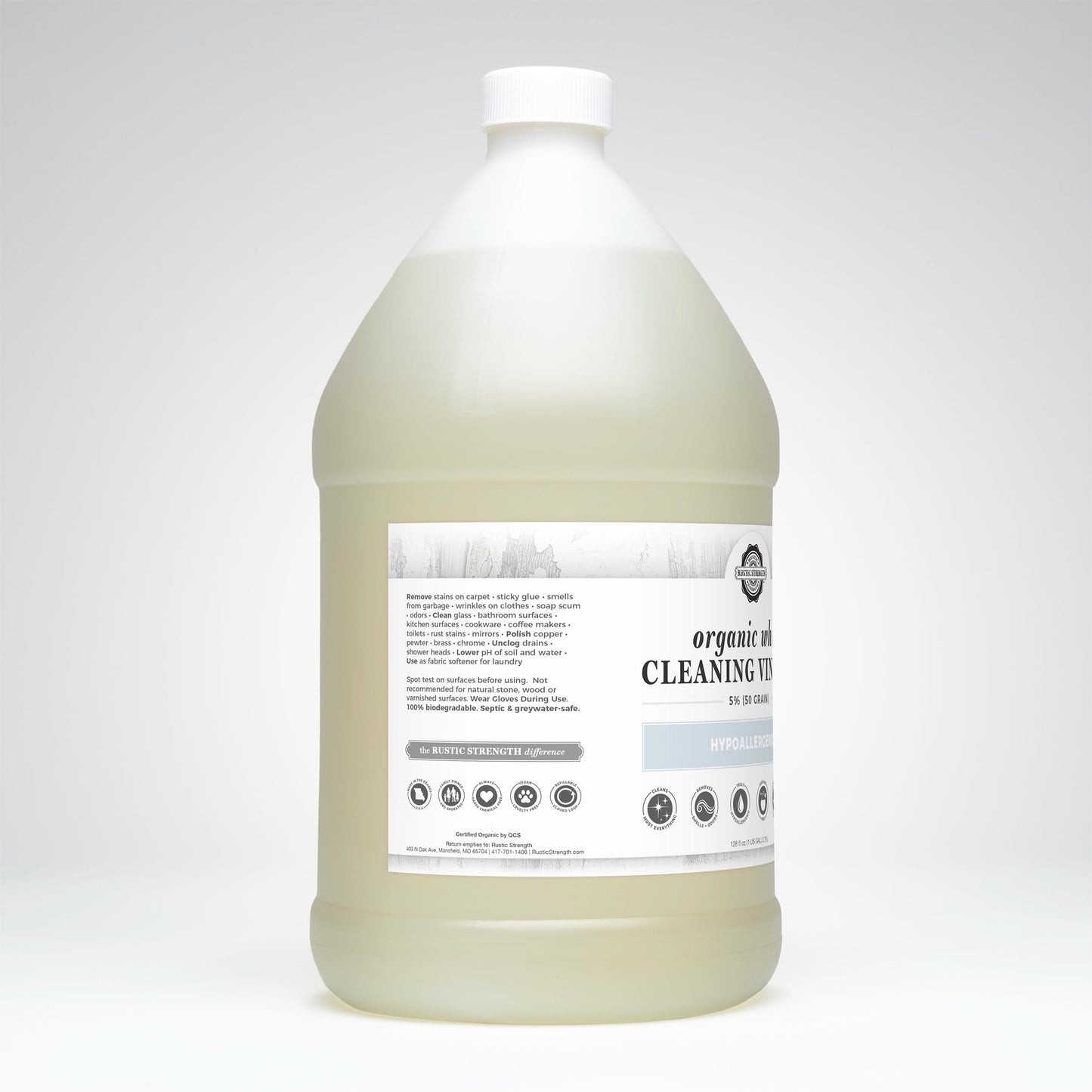 Gallon bottle of cleaning vinegar with a label on a white background