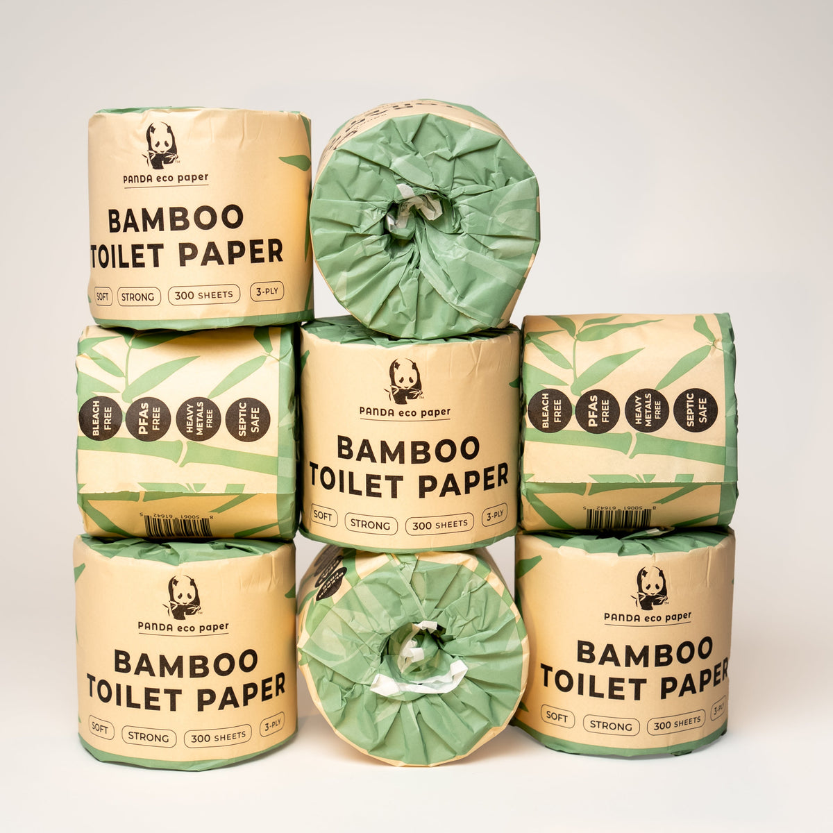 Stack of Panda Eco Paper Bamboo Toilet Paper rolls with packaging on a white background