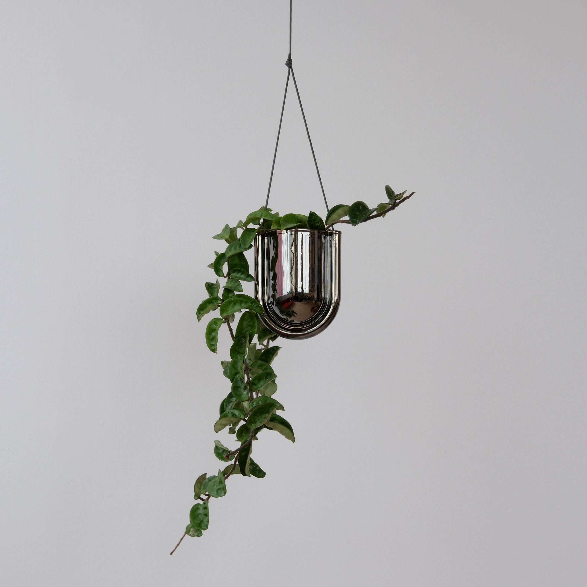 Portico Handmade Hanging Planter in Chrome, made with premium stoneware, shown on a plain background