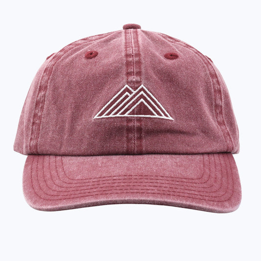 Rainier Watch Vintage Wash Dad Cap in Maroon with a white geometric logo on a white background