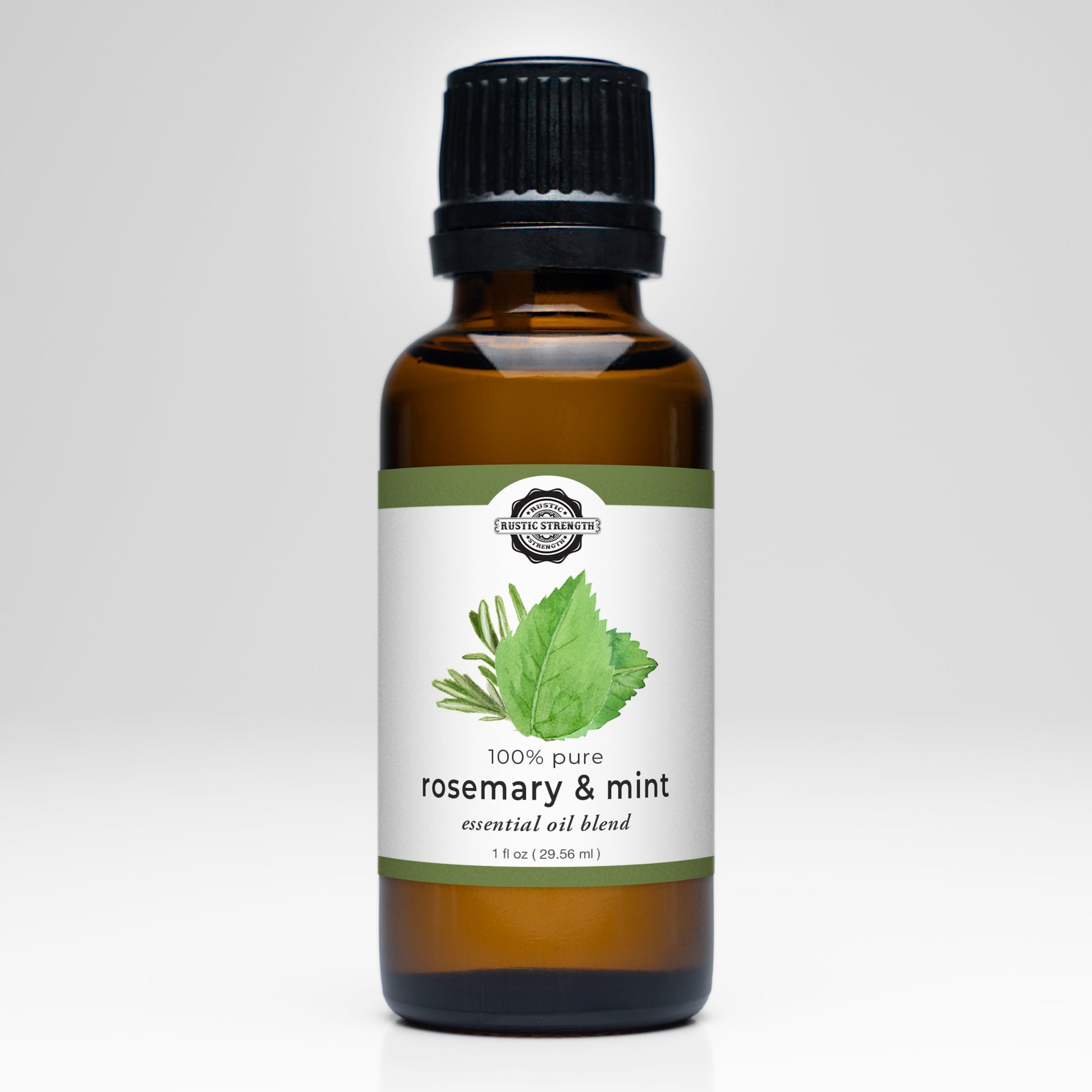 Bottle of rosemary and mint essential oil blend on a white background
