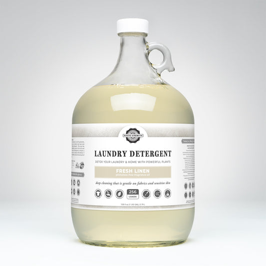 Gallon bottle of Rustic Strength Liquid Laundry Detergent Fresh Linen Scent with a label on a white background