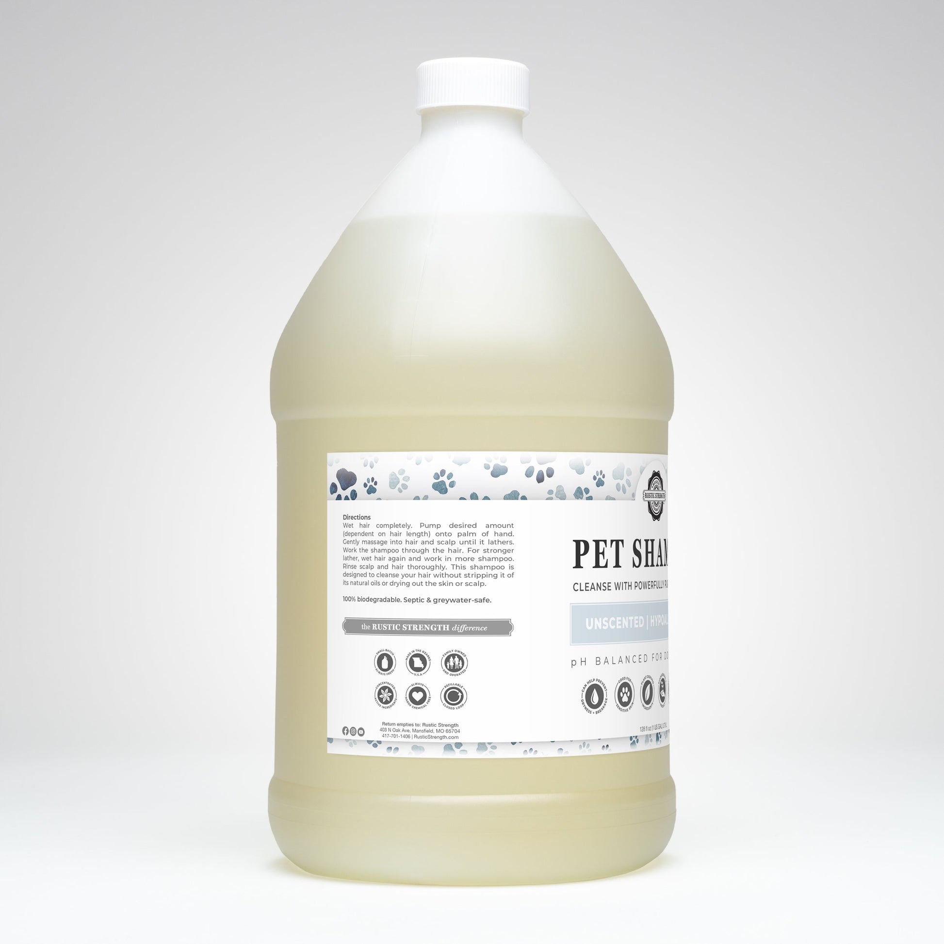 Gallon bottle of pet shampoo with a label on a white background