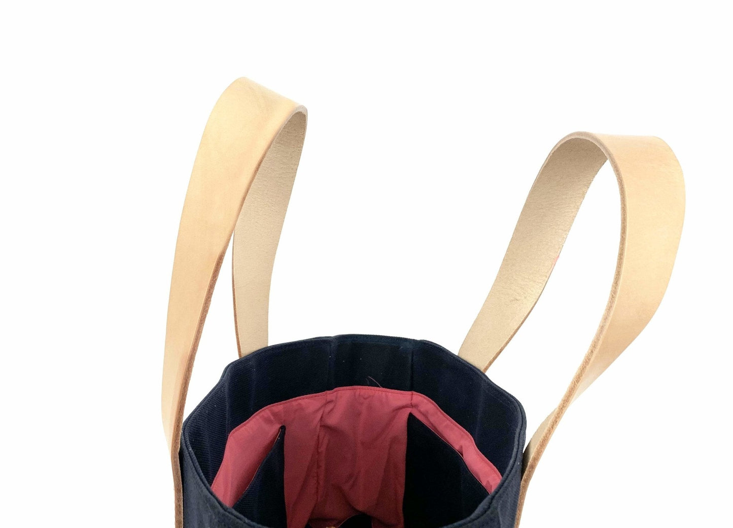 Waxed Canvas Tote Bag – Navy with Bright Pink Lining, Durable & Eco-Friendly, with beige handles on a white background