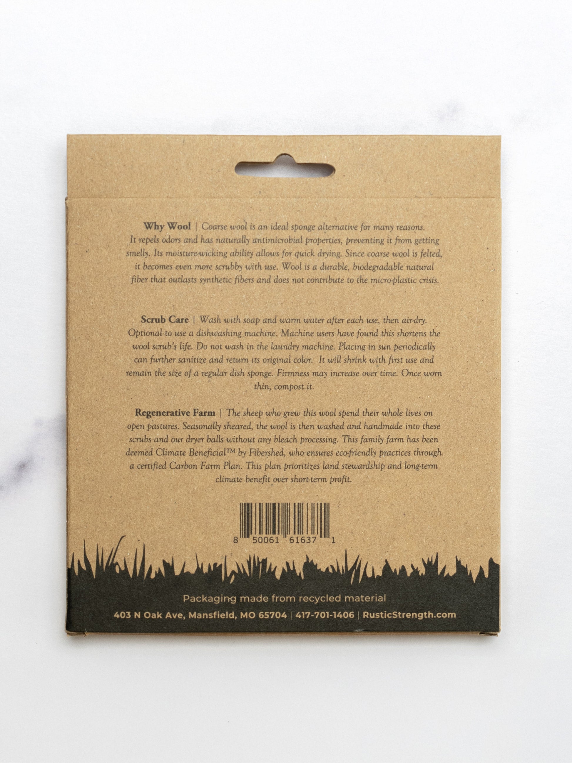 Back of a wool scrubs package with text and a barcode on a white background