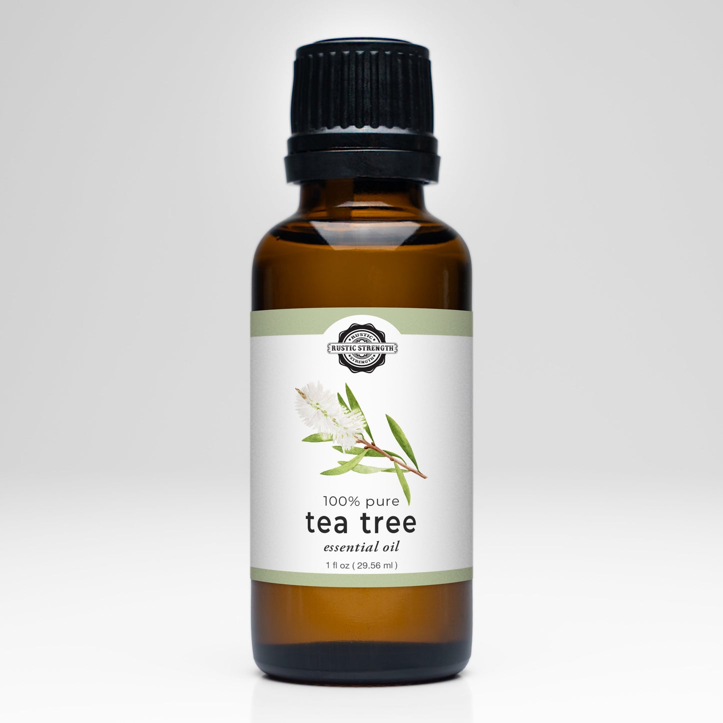 Bottle of 100% pure tea tree essential oil on a white background