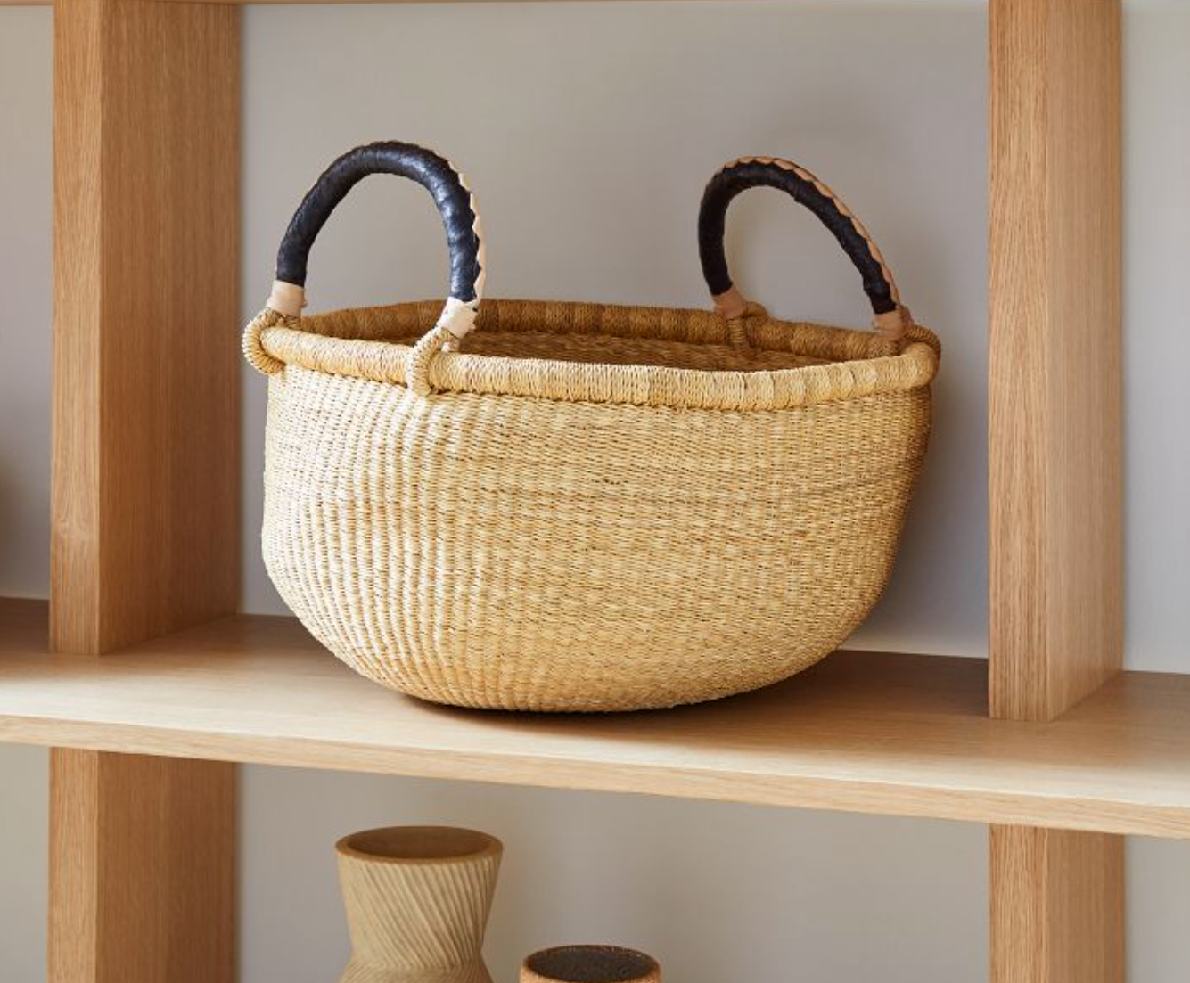 Large Round Two-Handled Bolga Basket in a Natural Palette