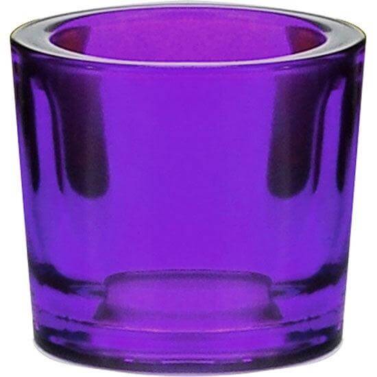 Violet glass candle holder on a white background